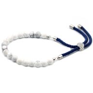 Pulsera de hilo azul marino de Khaulita Blanca