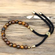 Pulsera de hilo negro con Ojo de Tigre