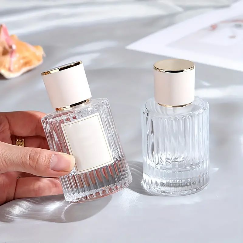 Frascos de vidrio para perfume con pulveridaor y tapa azul 30 ml