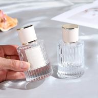 Frascos de vidrio para perfume con pulveridaor y tapa azul 30 ml