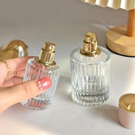 Frascos de vidrio para perfume con pulveridaor y tapa rosa 50 ml