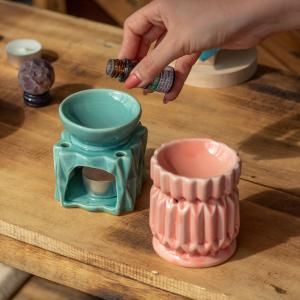 Quemadores de Aceite Florales y en Forma de Caldero