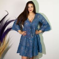 Nomad Sari en el Mar Mediterráneo Vestido con estampado de peces azules y dorados (M/L)