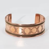 Pulseras de cobre con banda ancha y decoración de latón (surtidas)