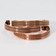 Pulseras con diseño de bandas de cobre e imanes (surtidas)