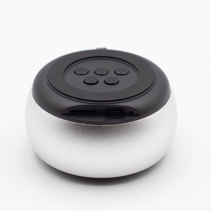 Altavoz mini plateado con efecto de iluminación Mandela