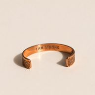 Pulseras de cobre macizo con grabados de afirmaciones (varias)