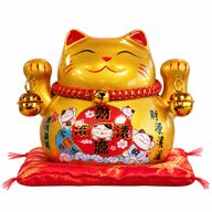 Hucha de gato de la suerte de cerámica - Dorado sobre cojín