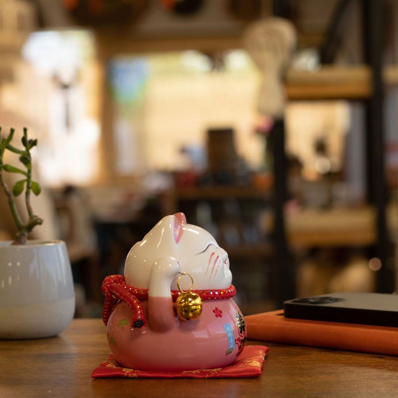 Hucha de cerámica gato de la suerte - Rosa sobre cojín