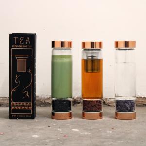 Proveedor de botella de cristal para té con gemas 